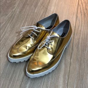 Metallic gold loafers